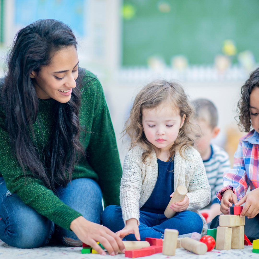 teacher with little girl